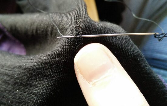 With the outside out, carefully connect the two healthy edges around the hole by sewing horizontally.