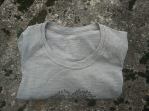 Lasting Merino 160 Back t-shirt - folded on a Norwegian cliff