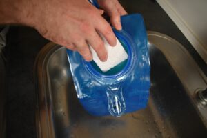 A kitchen scrubbing pad is a great tool for cleaning hydration bladders