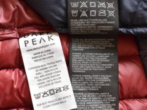 How to Wash Down Jackets - tags from Dark Peak and Jack Wolfskin down jackets